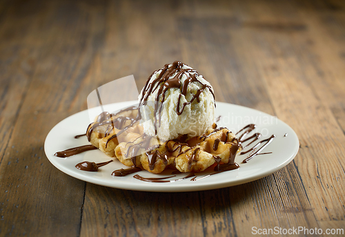 Image of plate of belgian waffle with ice cream