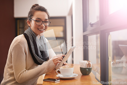 Image of Happy woman, portrait and cafe with tablet for research, online browsing or networking at indoor restaurant. Face of female person with smile on technology for communication or search at coffee shop