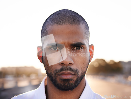 Image of Man, serious and portrait in street for fitness with health, closeup and headshot for training outdoor. Person, athlete and ready for workout, exercise and wellness with sports on metro road in city