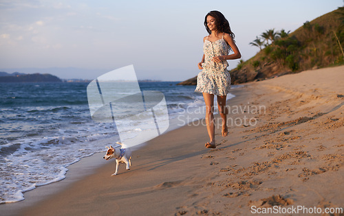 Image of Woman, running on beach and dog with travel for ocean, vacation in Cancun and nature with pet. Fresh air, wellness and energy with puppy outdoor, happiness for adventure and tourism on island