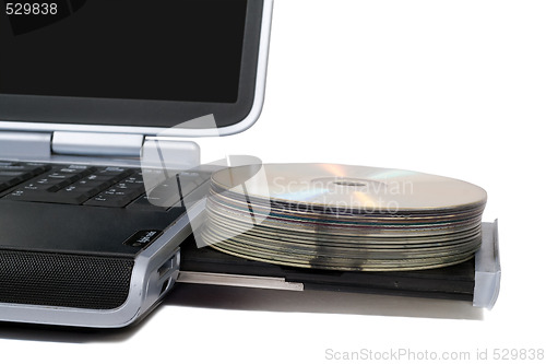 Image of Laptop with overloaded DVD Drive. Isolated on white background