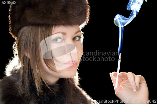 Image of Portrait of the beautiful woman with a cigarette