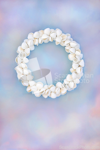 Image of Cockleshell Seashell Wreath on Rainbow Sky Background