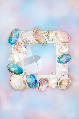 Image of Shell and Pearl Abstract Frame on Rainbow Sky