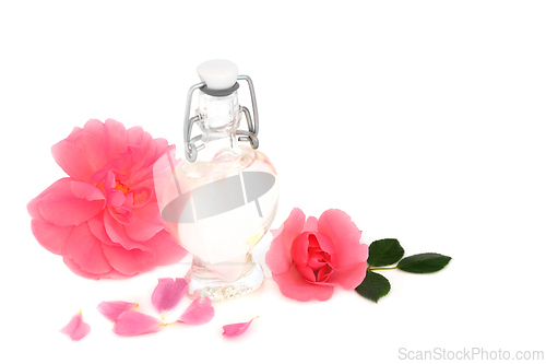 Image of Rosewater for Skin Care with Pink Rose Flowers
