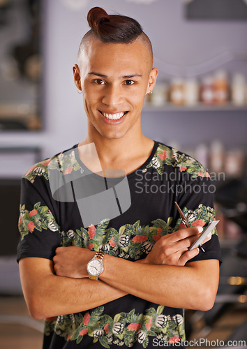 Image of Hairdresser, scissor and portrait of man for retail barber shop, boutique and haircare stylist. Hair salon, professional male person and arms crossed with comb for beauty, grooming and treatment