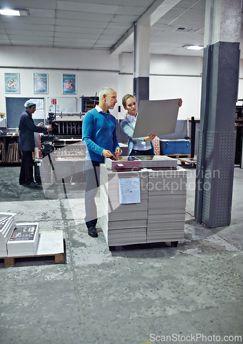 Image of Printing, factory and man and woman with paper for teamwork, collaboration or product inspection. Warehouse, supply chain and people for logistics, manufacturing and industrial production in workshop