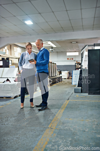 Image of Factory, tablet and people in warehouse for printing, quality control or freight distribution with teamwork. Manager, wholesale or inspector with stock logistics or shipping info for supply chain