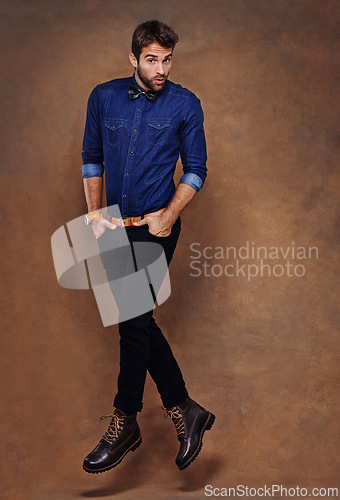 Image of Fashion, jump and studio for male person, face and formal clothing isolated on background. Confidence, stylish and portrait for employee or worker man model, professional or business or trendy outfit