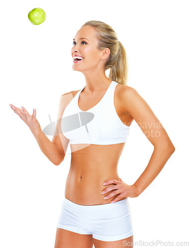 Image of Woman, apple and studio for diet nutrition on white background for lose weight, fiber or training. Female person, smile and fruit snack with mockup space for health benefit or progress, goal or meal