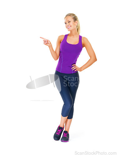 Image of Fitness, mockup or happy woman with hand pointing in studio for gym, sign up or membership on white background. Exercise, space or lady model show workout revere, feedback or body transformation tips