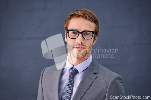 Image of Caucasian, man and business with glasses in studio for paralegal work, clerk or assistant or counsel. Businessman and spectacles on backdrop for legal profession, associate attorney or barrister