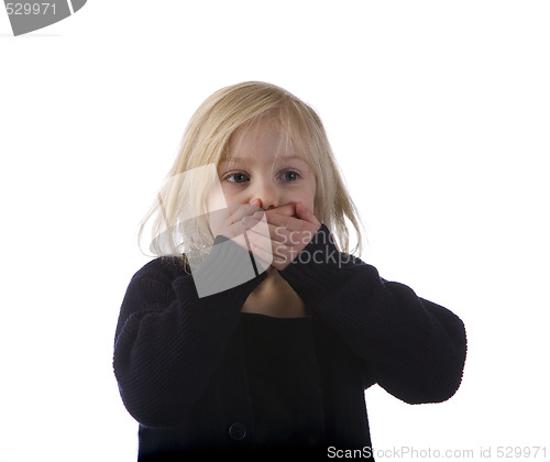 Image of Child Covering Mouth in Surprise