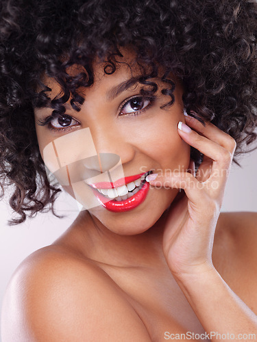 Image of Skincare, smile and portrait of black woman with makeup, afro and beauty with confidence in studio. Dermatology, facial cosmetics and happy model girl with red lipstick isolated on white background