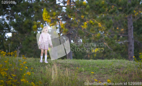 Image of Girl Singing After Climbing a Hill