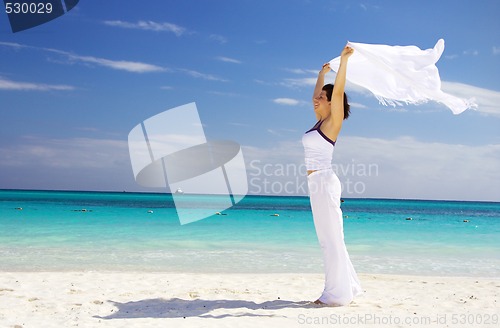 Image of happy woman with white sarong