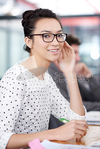 Image of Happy, portrait and creative woman at desk in office planning with notes for project or report. Professional, employee and person with a smile for productivity, process or work on idea or writing