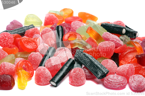 Image of colored candies over white background