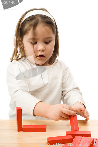 Image of Child Playing With Block