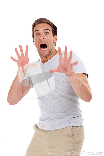 Image of Shocked, scared and portrait of man on a white background for surprise, horror and fear reaction. Shouting, screaming and isolated person with hand gesture for terror, anxiety and afraid in studio