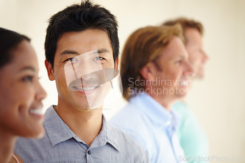 Image of Asian man, diversity and coworker in row with smile for teamwork or collaboration and coworking as consultant. Portrait, colleagues and people as employees with confidence for business and growth