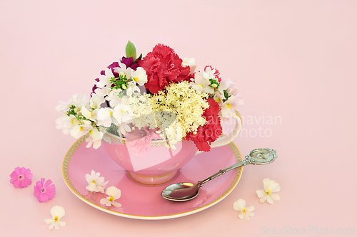 Image of Surreal Summer Flower Teacup Composition
