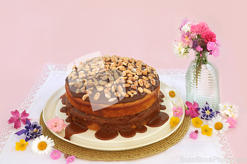 Image of Peanut and Caramel Sauce Cake with Summer Flowers
