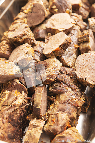 Image of Close up shot of succulent slow-cooked beef