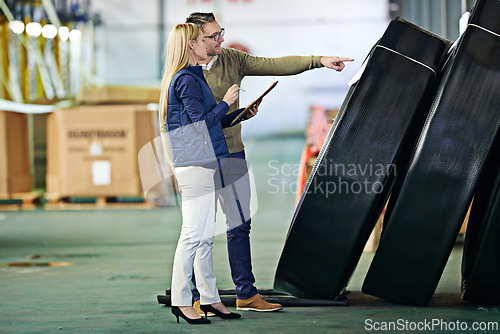 Image of Business people, logistics and clipboard in warehouse for delivery, shipping inventory and stock inspection. Distribution, industrial factory and teamwork for freight, supply chain or quality control