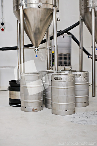 Image of Steel tank, keg and beer production at brewery with equipment for process, factory and storage with craft drink. Alcohol, metal container and industrial machine, brewing system and manufacturing