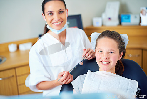 Image of Consulting, happy and portrait of dentist with child for cleaning, teeth whitening and wellness. Healthcare, dentistry and woman and girl with tools for dental hygiene, oral care and medical services