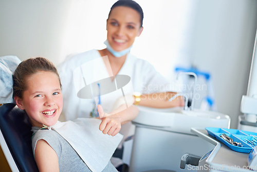 Image of Thumbs up, dentist and portrait of child in chair for cleaning, teeth whitening and wellness. Healthcare, dentistry and woman and girl with emoji for dental hygiene, oral care and medical services
