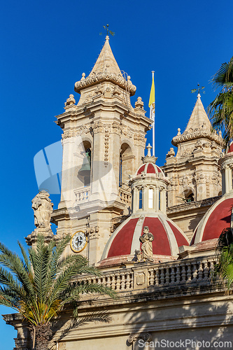 Image of Majestic Zabbar Parish Church in Malta against the evening sky at sunset.