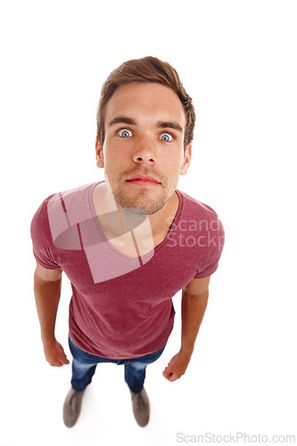 Image of Wow, eyes and portrait of shocked man in studio with top view surprise, announcement or deal on white background. Omg, face or male model with emoji for unexpected news, info or competition giveaway