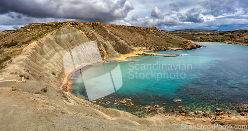 Image of Ghajn Tuffieha Bay and Qarraba Bay with red sand. Malta