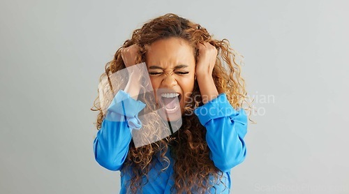 Image of Woman, anger and screaming with depression in studio for stress, mental health and death by background. Girl, person or model with anxiety, frustrated and shouting with rage, fist and panic attack