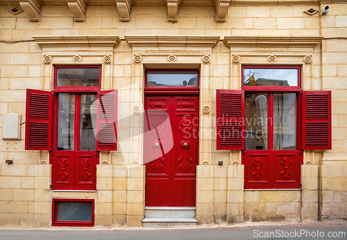 Image of Traditional Maltese house, with colorful doors and windows. Zabbar Malta