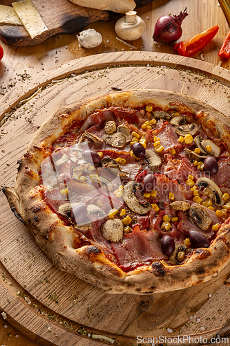Image of Classic Italian cuisine. Capricciosa pizza