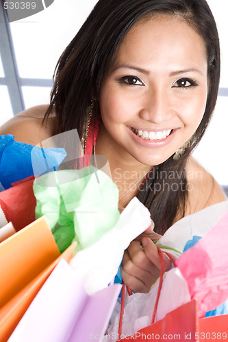 Image of Shopping asian girl