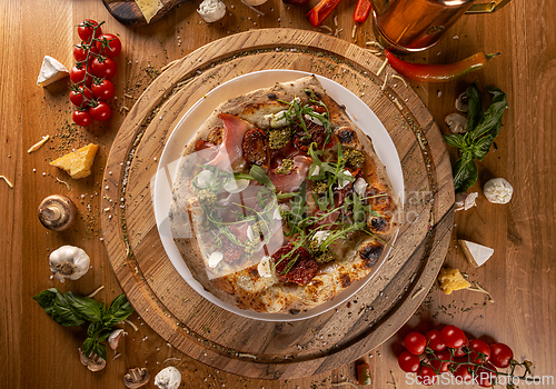 Image of Pizza mortadella with mozzarella cheese