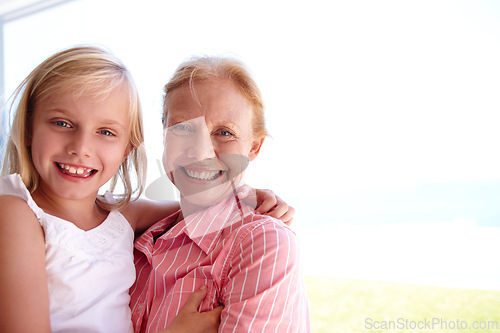 Image of Portrait, grandmother and girl with generations at family house by embrace, bonding and love in garden. Grandma, people and child in outdoors on vacation at childhood home with nature for memory