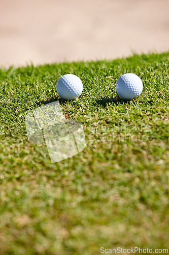 Image of Golf ball, grass and closeup for sports, play and hobby for recreation in summer outdoor. Equipment, round and mockup on field for training, athlete and activity on green lawn for practice and game