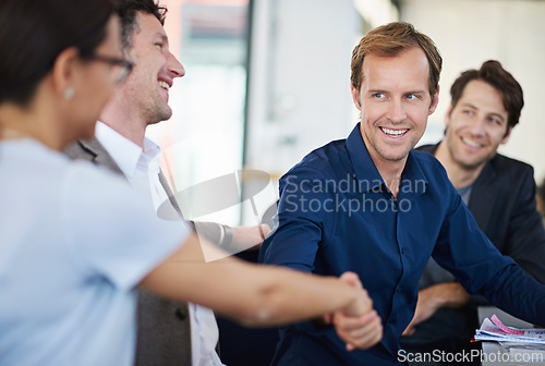 Image of Business people, team and handshake for welcome in office, partnership and b2b connection for deal. Colleagues, hr and networking for recruitment, offer and onboarding in interview for opportunity