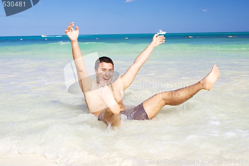 Image of happy man on the beach