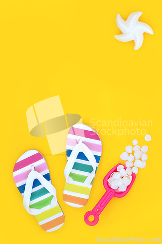 Image of Summer Seaside Vacation with Rainbow Flip Flops