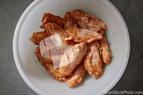 Image of fresh raw chicken wings with spices