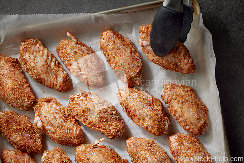 Image of fresh raw chicken wings with spices