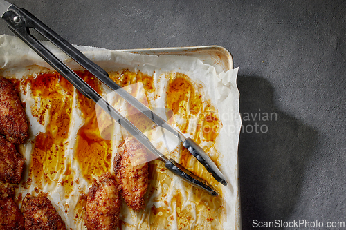 Image of closeup of baked crispy chicken wings