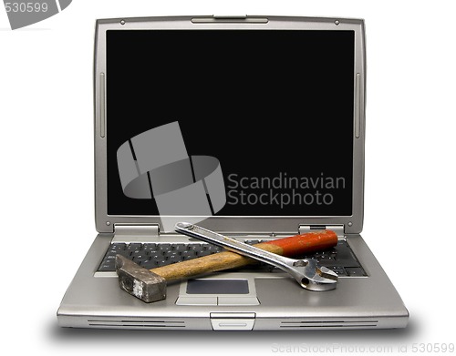 Image of laptop and tools