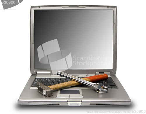 Image of laptop and tools